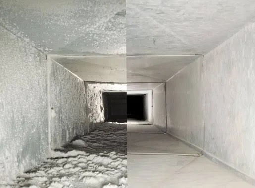 A technician from A&K Service Inc. cleaning supply vents inside an Alpharetta, GA home using professional duct cleaning equipment. The image shows the interior of a residential duct run with visible dust and debris being extracted.