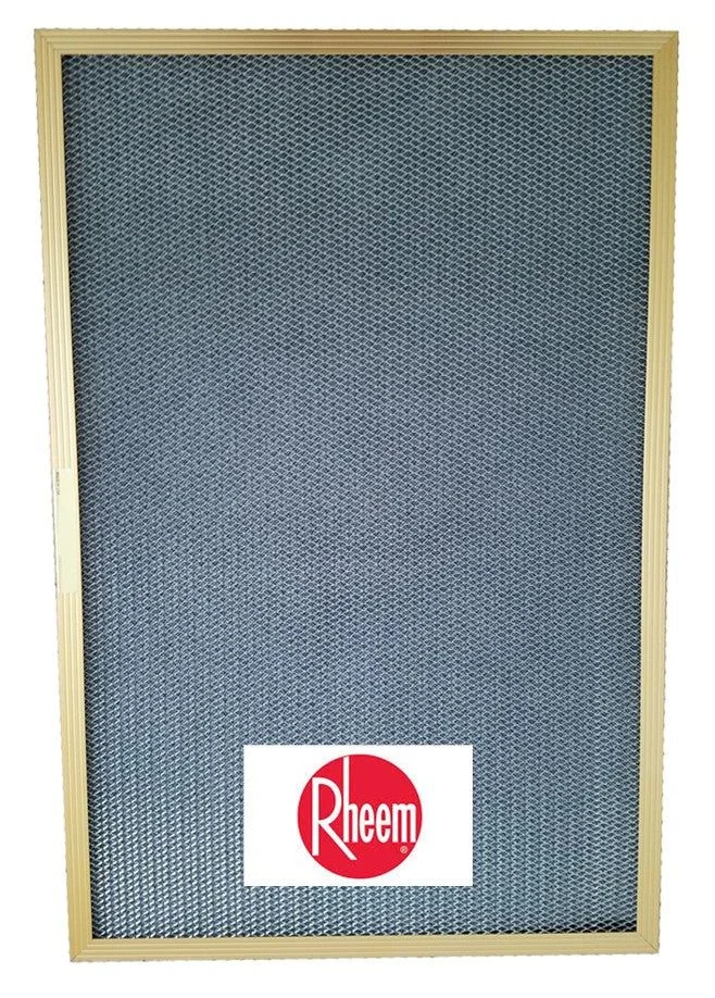 A technician from A&K Service Inc. replacing a clogged HVAC air filter in an Alpharetta home. The old filter shows visible gray dust buildup consistent with heavy pollen and humidity conditions in the North Fulton area.