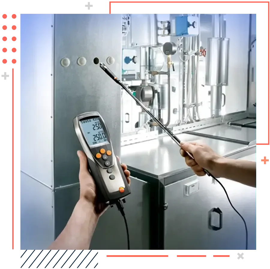 A technician from A&K Service Inc. collecting an air sample near a residential HVAC return vent inside an Alpharetta home. Testing equipment sits on a nearby surface while ductwork is visible in the background.